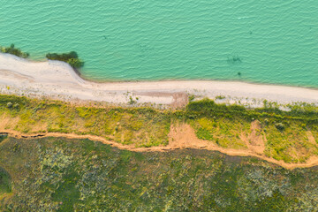 Sea coast. Aerial view of the beach and waves