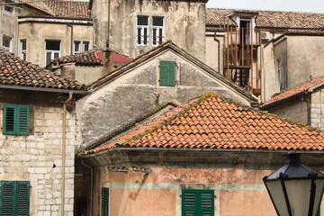 Fototapeta na wymiar Close-up on old town houses. Kotor. Montenegro.