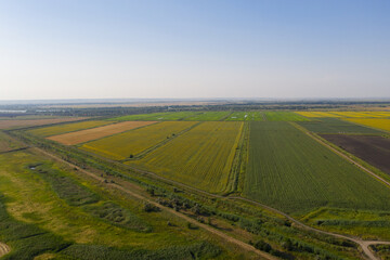 Drone flies over farm land