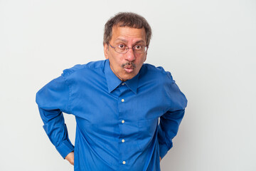 Middle aged indian man isolated on white background being shocked because of something she has seen.