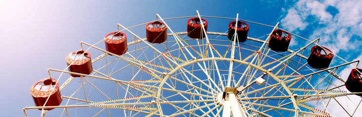 Retro ferris on a blue sky background