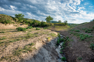 a small stream on the mid-prairie