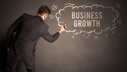 businessman drawing a cloud with inscription