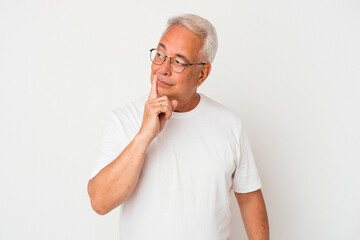 Senior american man isolated on white background contemplating, planning a strategy, thinking about the way of a business.