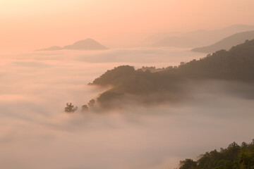 Beautiful sunshine at misty morning mountains,Foggy Landscape. Early Morning Mist