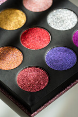 eye shadow makeup multicoloured glitter on white background