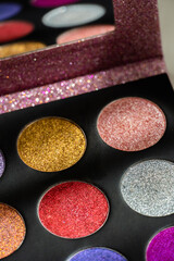 eye shadow makeup multicoloured glitter on white background
