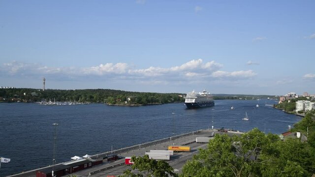 Large cruise ship passing the point Waldemars udde in the evening in the creek Saltsj&ouml;n in Stockholm 