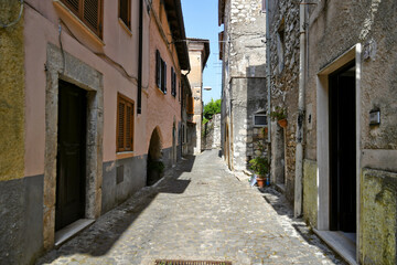 Fototapeta na wymiar Maenza, Italy, July 24, 2021. A street in the historic center of a medieval town in the Lazio region.
