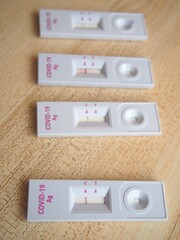 Negative covid-19​Rapid Antigen Test isolated on wooden​ background with nasal swab stick
