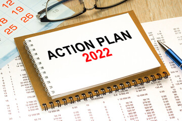 ACTION PLAN 2022.. office accessories on the table .