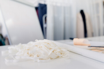 Closeup of rubber bands of bra strap blank