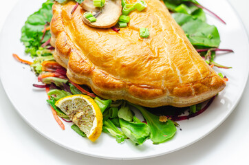Steak and ale pasty, British steak with ale, potato and leek, wrapped in puff pastry
