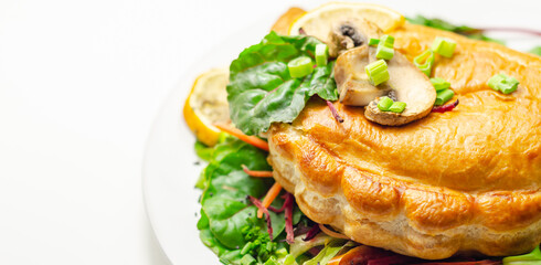Steak and ale pasty, British steak with ale, potato and leek, wrapped in puff pastry