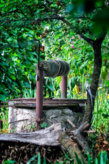 Vintage rustic with old well village on deep light background for lifestyle design,Old well in the village