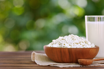yogurt and cottage cheese on table outdoors