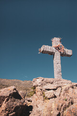A cross at the top of a mountain in Peru
