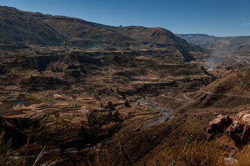 A river streaming through a valley in Peru