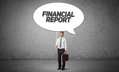 business person in casual holding road sign