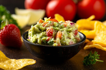 Strawberry and avocado guacamole, salsa with crispy tortilla chips