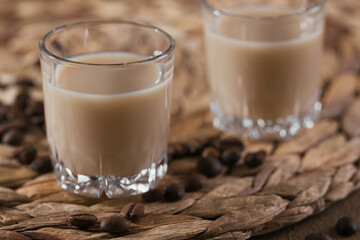 Short glasses of Irish cream Liquor or Coffee Liqueur with coffee beans