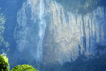 Beautiful Staubbach falls at Bernese Highland, the waterfall drops 297 metres (974 feet) from a...