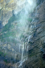 Beautiful Staubbach falls at Bernese Highland, the waterfall drops 297 metres (974 feet) from a...