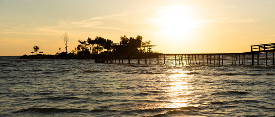 Evening view of the sea with sun loungers