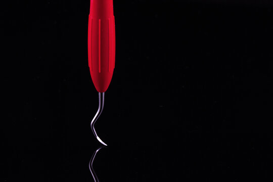 Dental minimalism tool on black background
