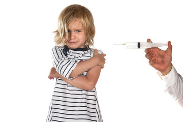 Little unhappy girl isolated on white background getting the vaccine - 447157632