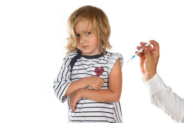 Little distrustful girl isolated on white background getting the vaccine - 447157644