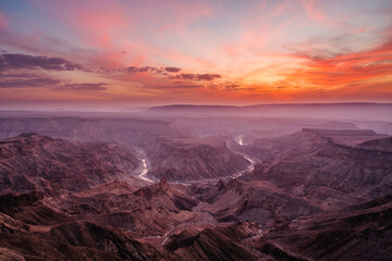 Epic sunset over the Fish River Canyon in Namibia, the second largest canyon in the world and the...