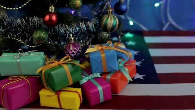 New Year, Christmas colorful gifts under the Christmas tree, close-up 