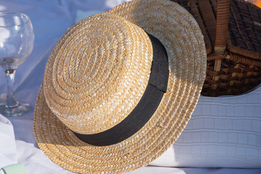Wicker straw hat outdoors (picnic).