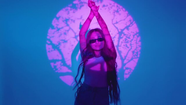 three sexy girls dance in the studio