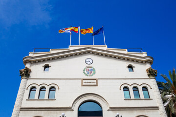 Casa Consistorial city hall in Badalona, Barcelona, Catalunya. Flags.