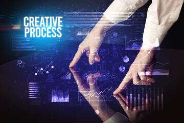 Businessman touching huge screen