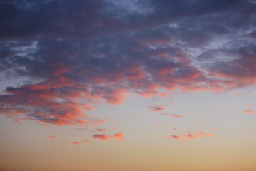 red sunset sky with dark clouds