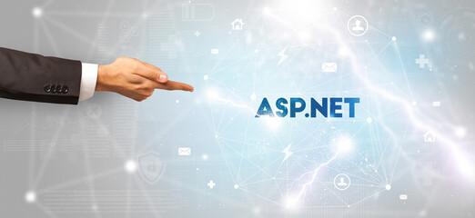 Hand pointing at inscription