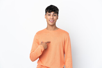 Young man over isolated white background with surprise facial expression