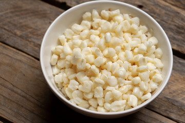 White hominy for mexican pozole on wooden background