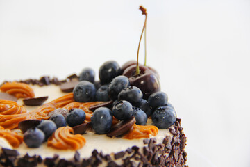 chocolate cake with cherry. cake with chocolate and cream
