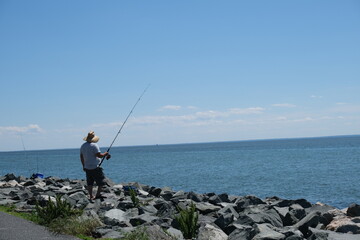 A man fishing at Tilghman Island  on the Maryland side of the Chesapeake Bay.