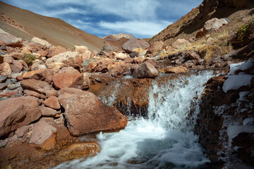 Fototapeta na wymiar river waterfall in the mountains