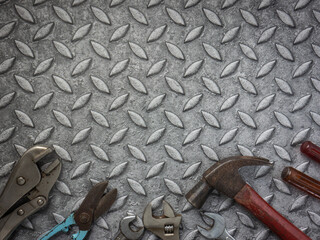 tools  on Checker plate  for safety  or engineer concept.