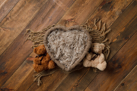 The tub has hairs on the wooden floor. for photographing newborns