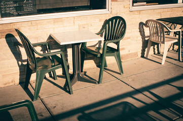 Old aged photo of outdoor chair and table on patio