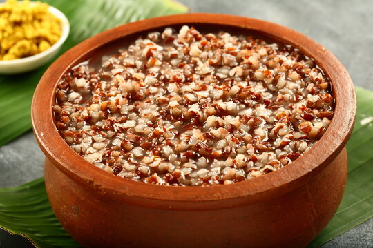 Homemade organic red rice kongee, porridge, with husk, bran, healthy vegan diet meal, 
