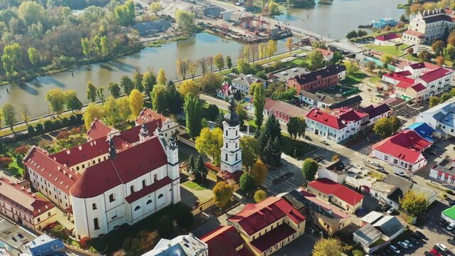 Pinsk, Brest Region, Belarus. Pinsk Cityscape Skyline In Autumn Morning. Bird's-eye View Of Cathedral Of Name Of The Blessed Virgin Mary And Monastery Of The Greyfriars. Famous Historic Landmarks