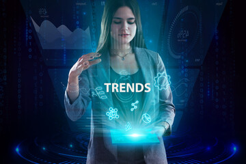 Business, Technology, Internet and network concept. Young businessman working on a virtual screen of the future and sees the inscription: Trends
